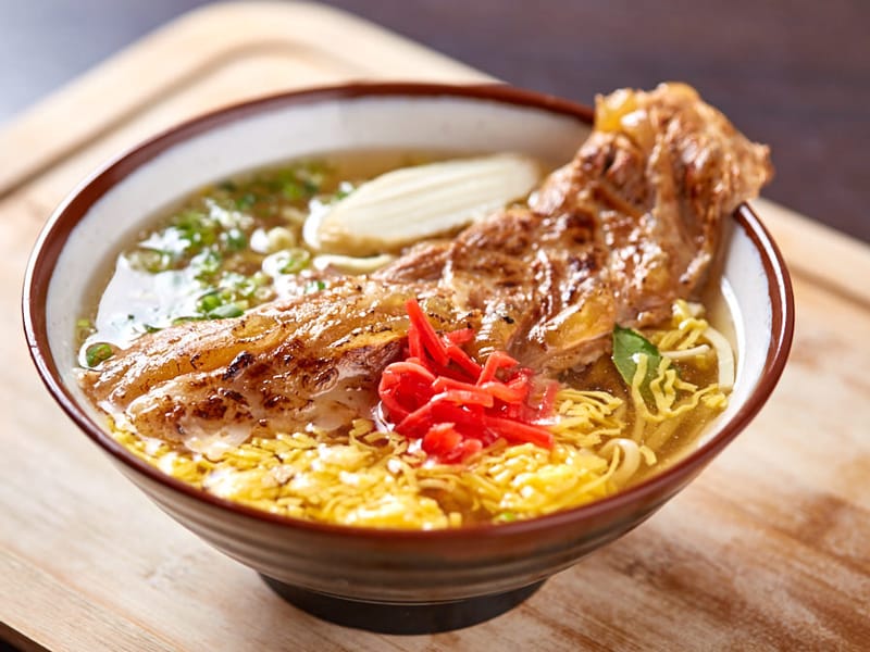 Okinawa Soba topped with extra-large roasted pork gristle